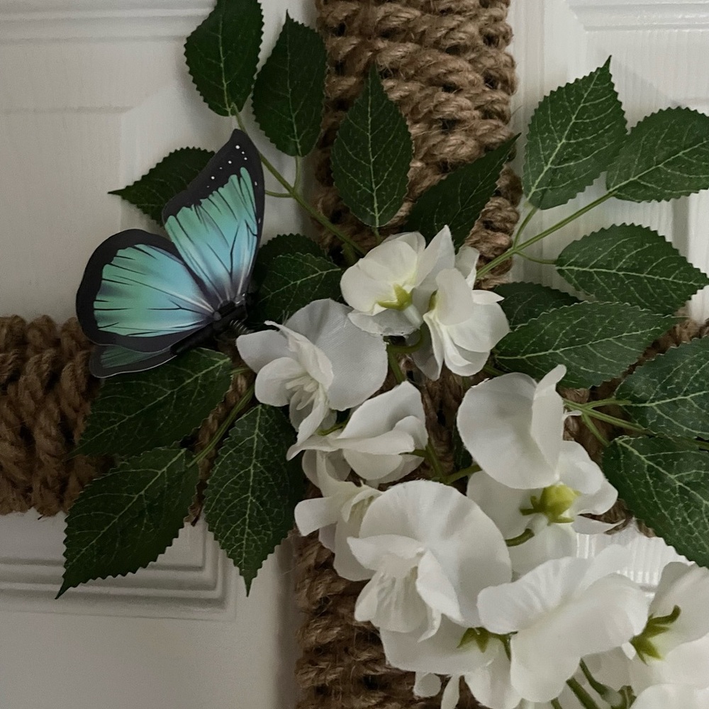 Hand Crafted Tan Rope Cross with White Blossoms and Blue Butterfly - Picture 3 of 4